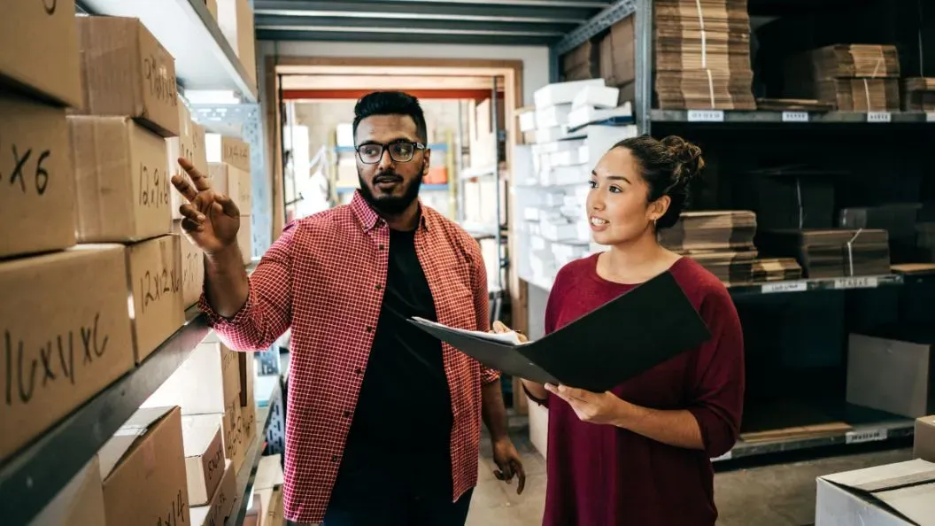 Man showing woman storage options.