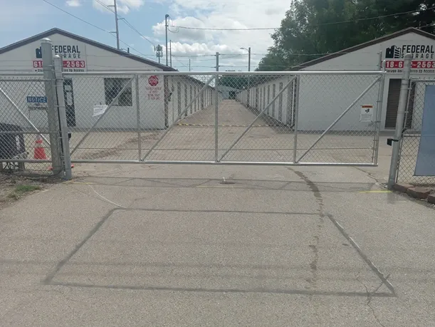View of gate at Federal Storage facility.