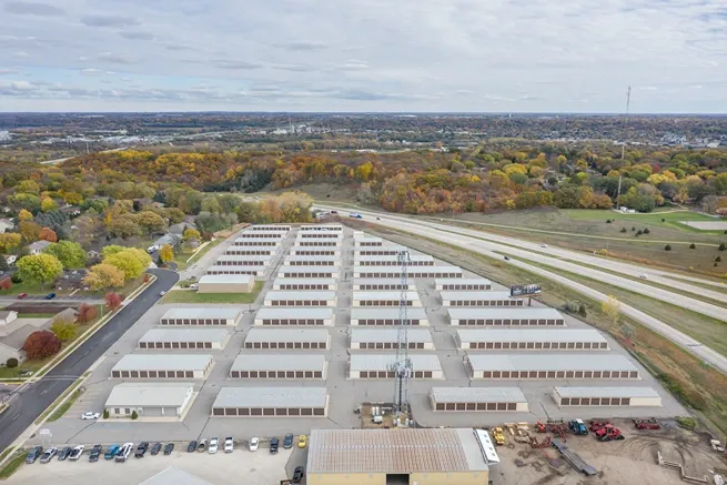 Wide view of unit buildings and access lanes at Osprey Storage Mankato.