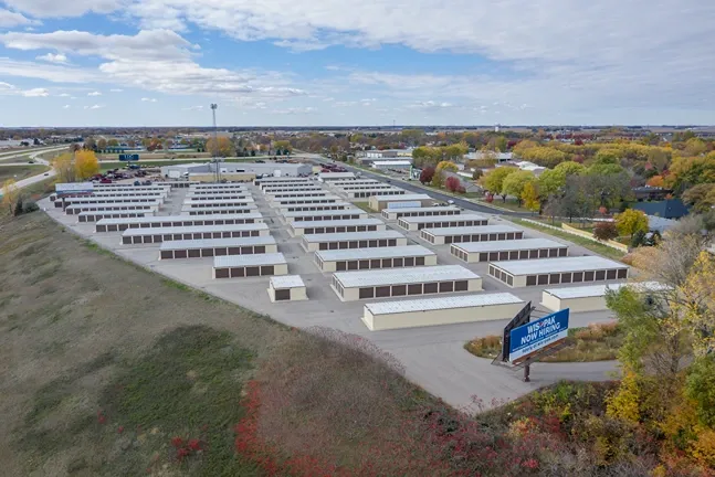 Side view of drive-up units and paved lanes at Osprey Storage Mankato.