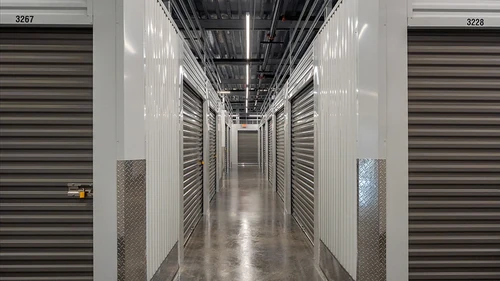 Modern interior with storage access and camera surveillance at Storage Lounge.